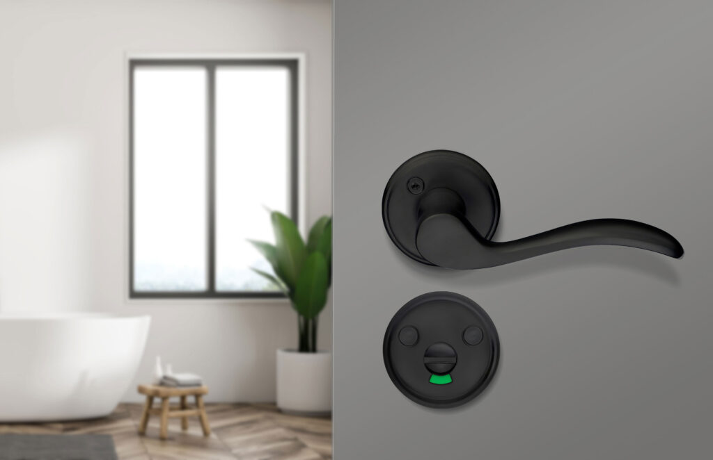 black door handle with wc knob on gray door